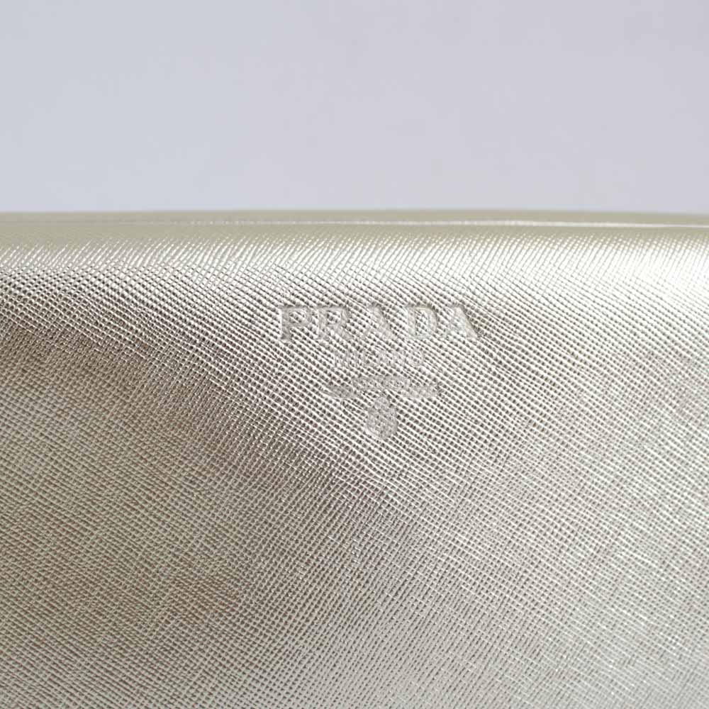 PRADA BEAUTY POCHETTE SAFFIANO ORO